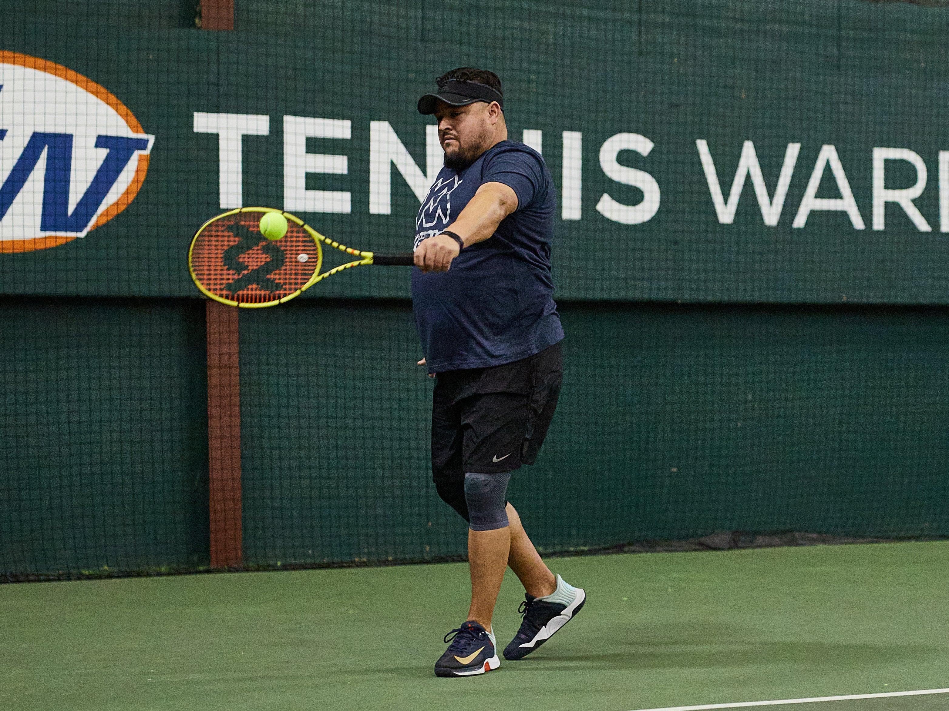 TW playtester hitting a backhand with the C10 Pro. 