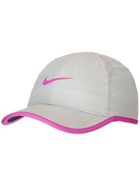 white nike hat with pink swoosh
