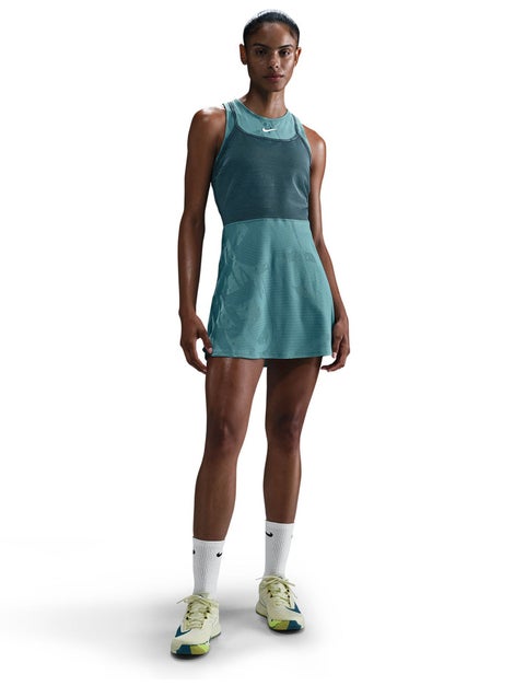 woman modeling a blue tennis dress