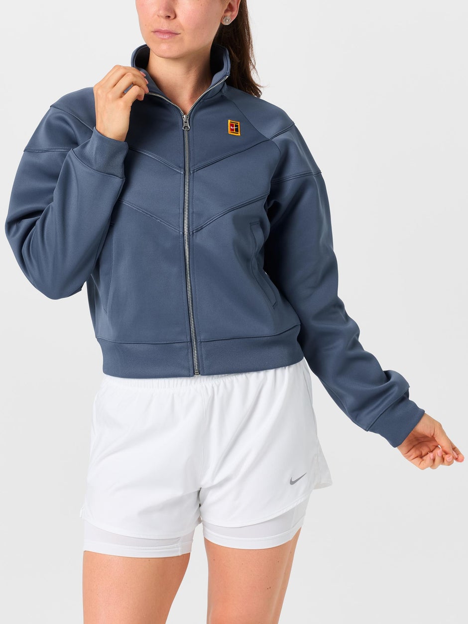 Woman in a tennis jacket. 
