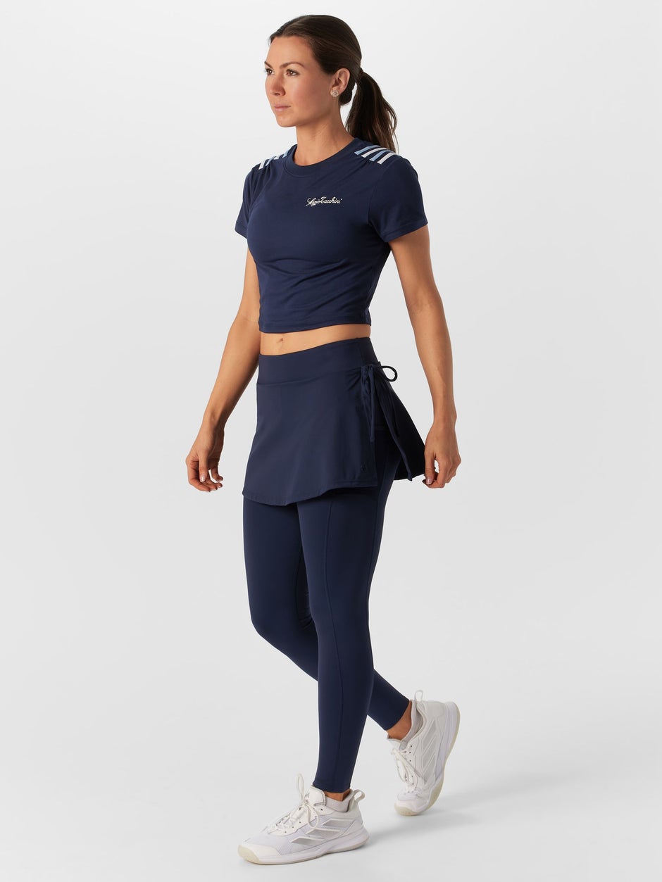 Woman in tennis leggings. 