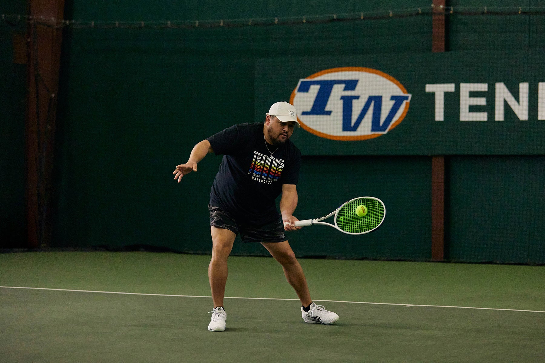 TW playtester hitting a forehand.