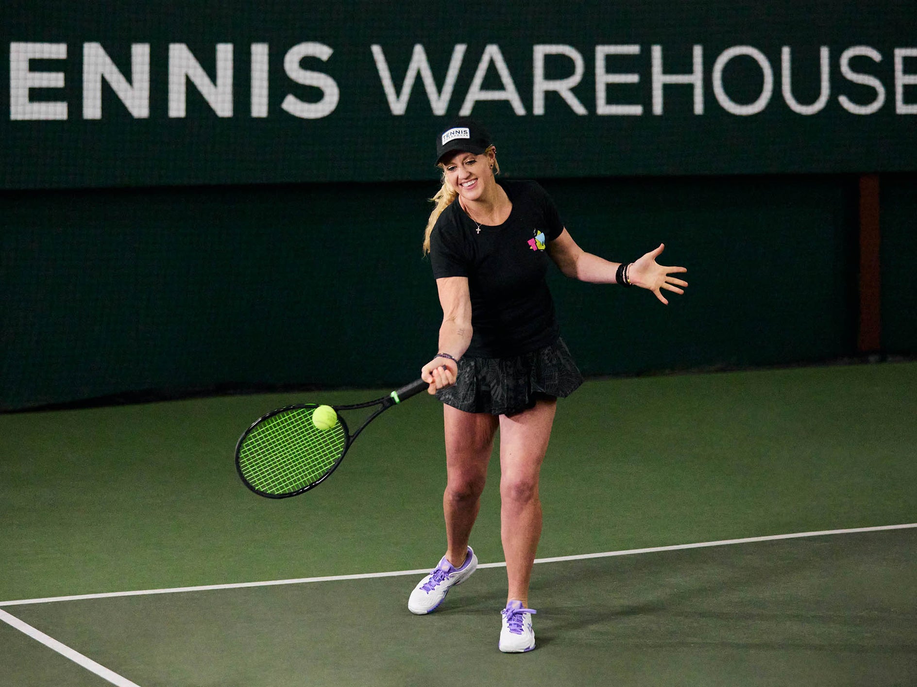 TW playtester hitting a forehand. 
