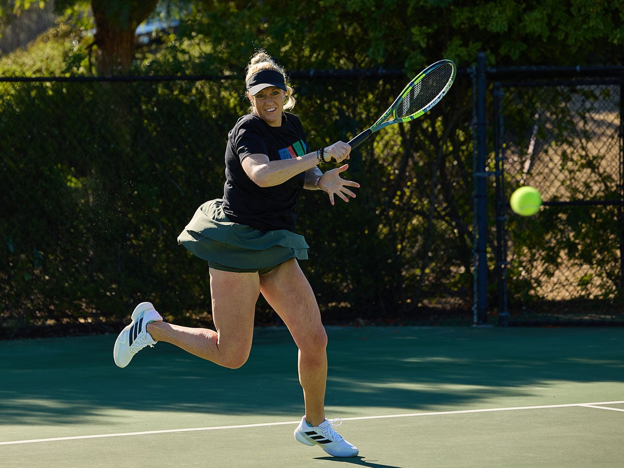 TW playtester hitting a forehand.