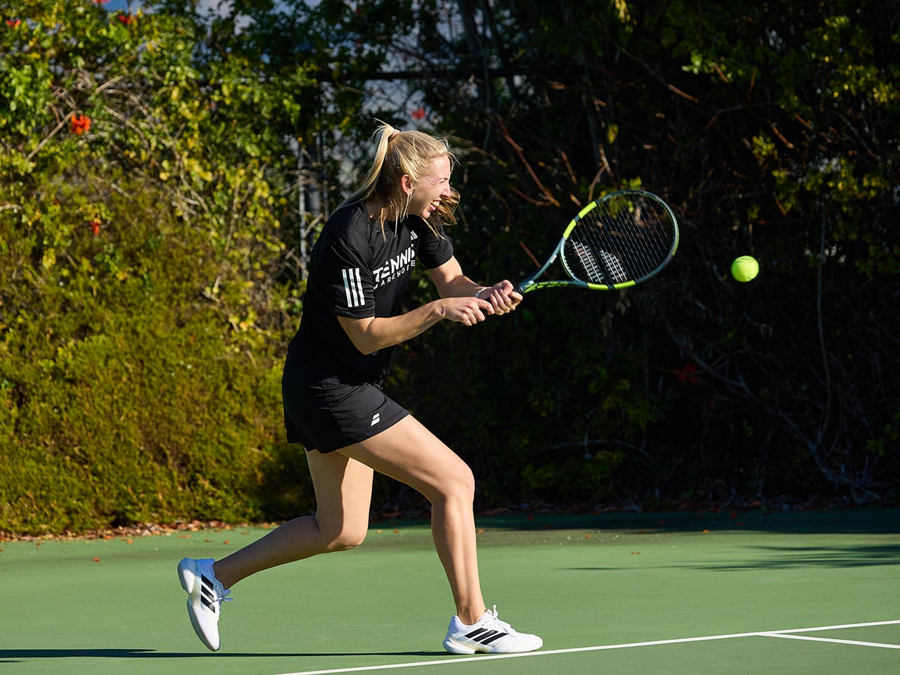 TW playtester hitting a backhand.