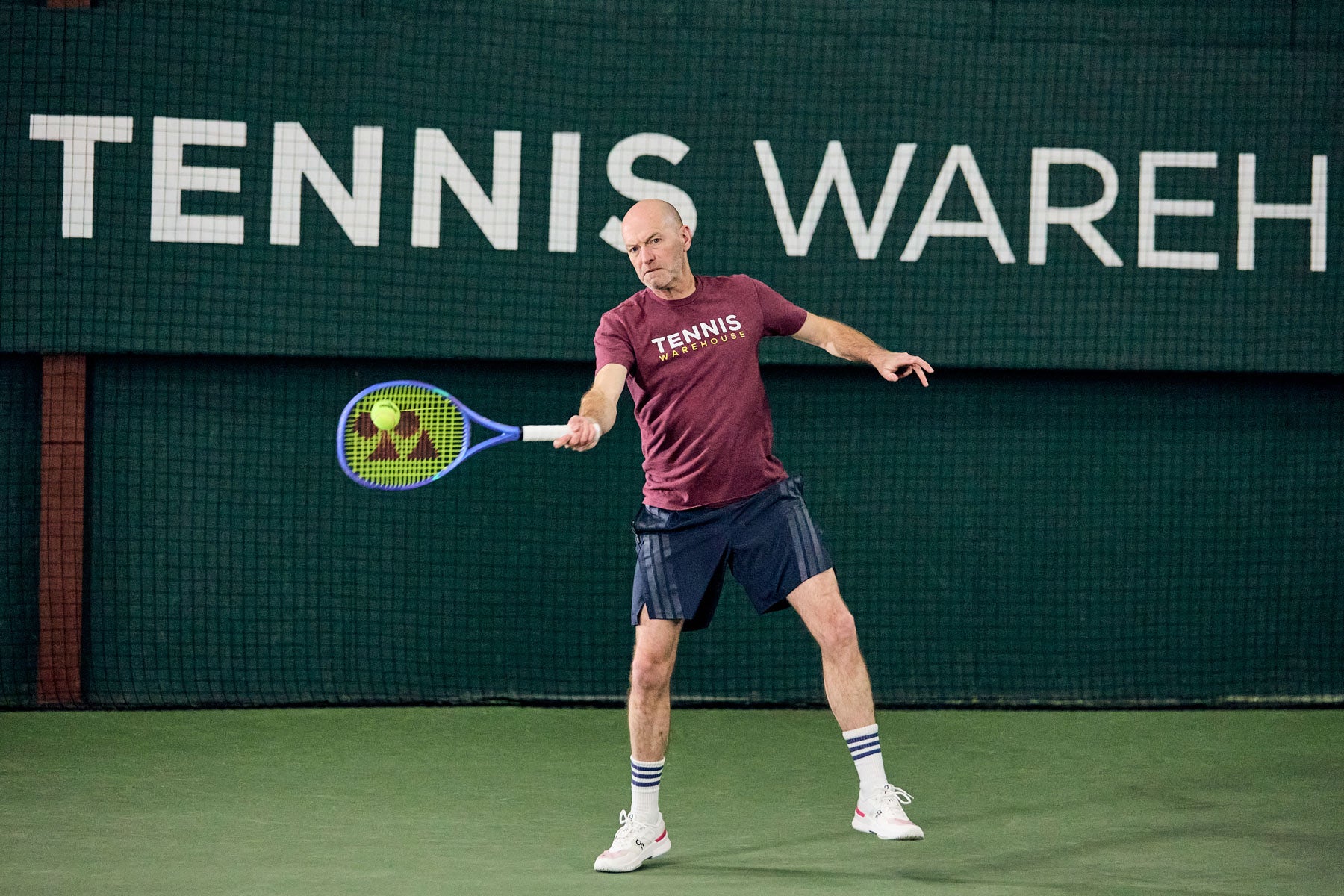 TW playtester hitting a forehand.