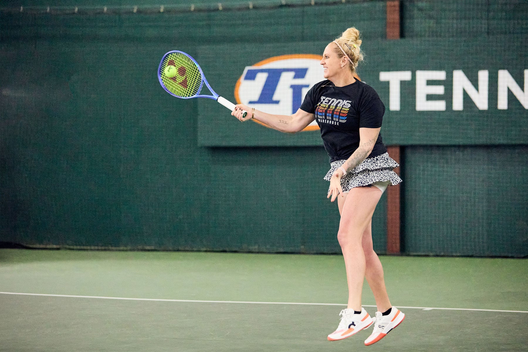 TW playtester hitting a forehand. 