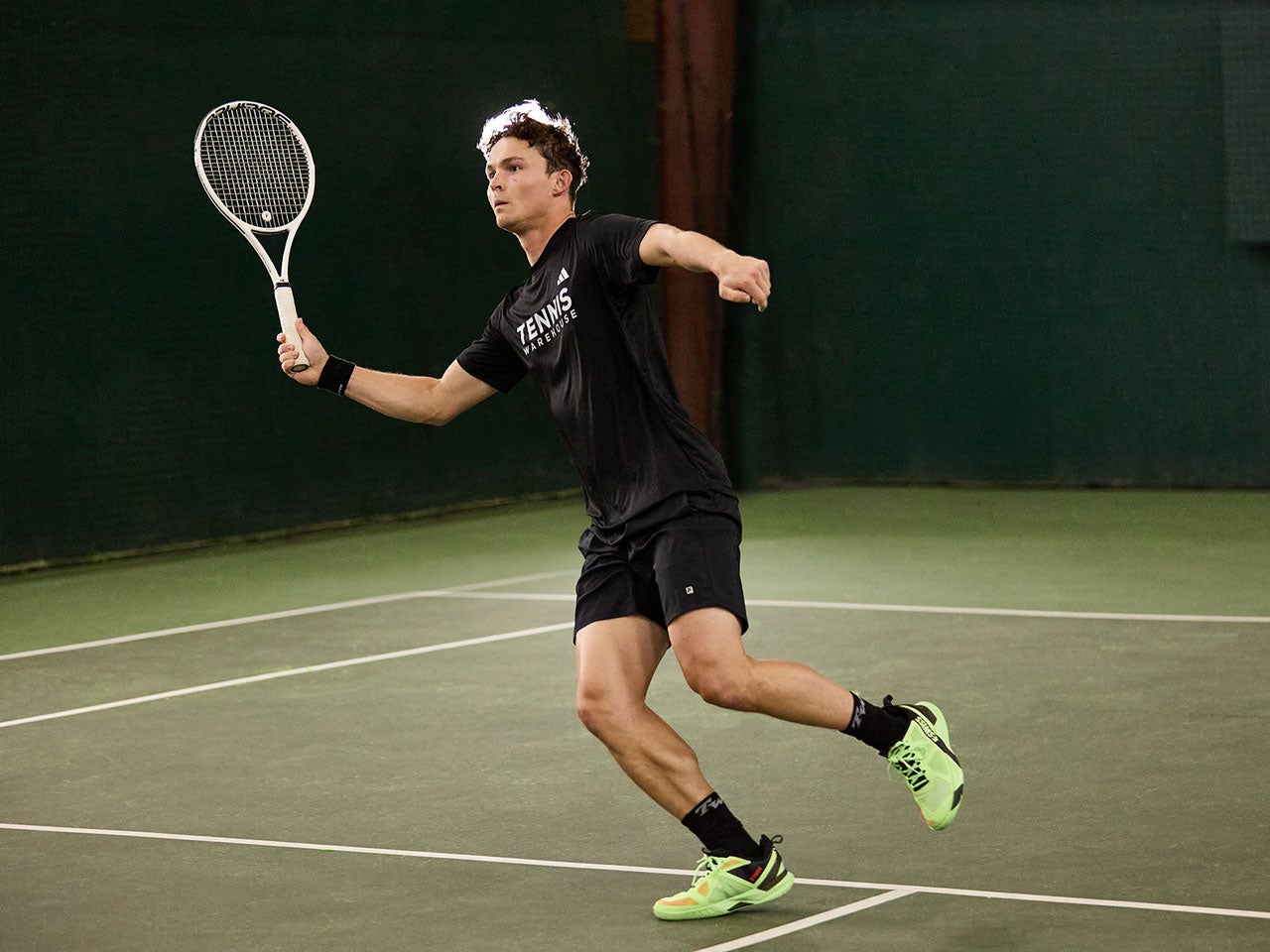 TW playtester hitting a volley. 