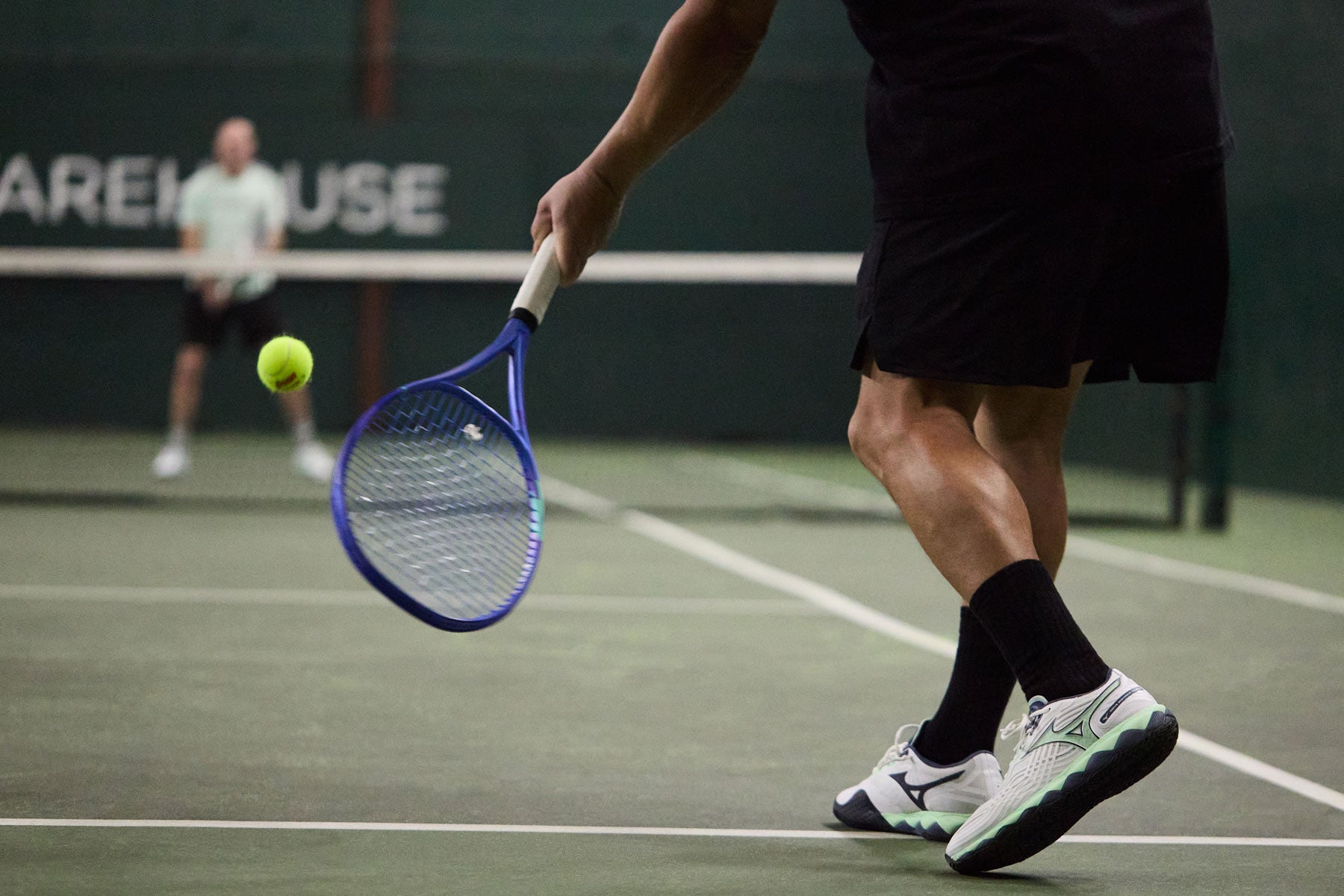 TW playtester hitting a low ball. 