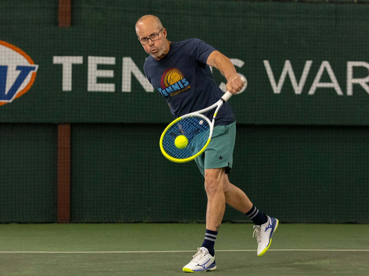 TW playtester hitting a backhand slice.