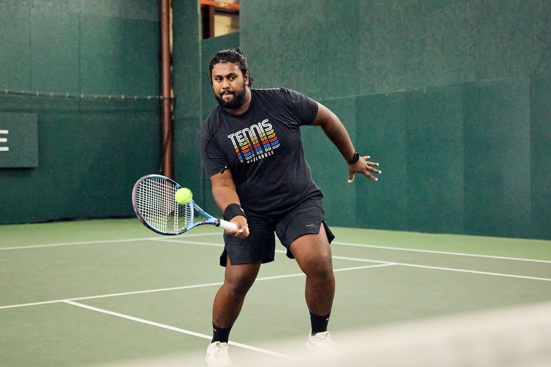 TW playtester hitting a volley. 