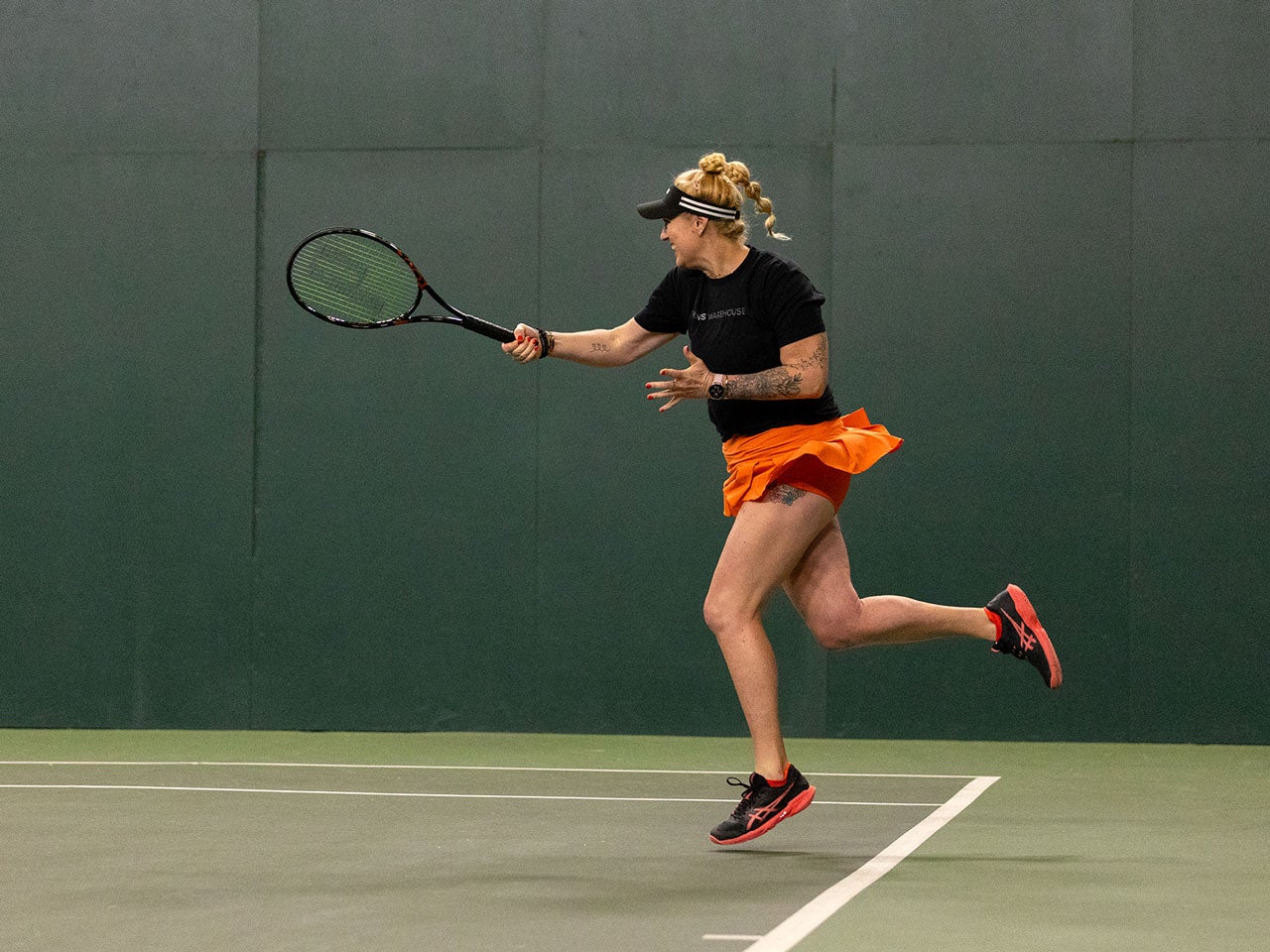 TW playtester hitting a forehand. 