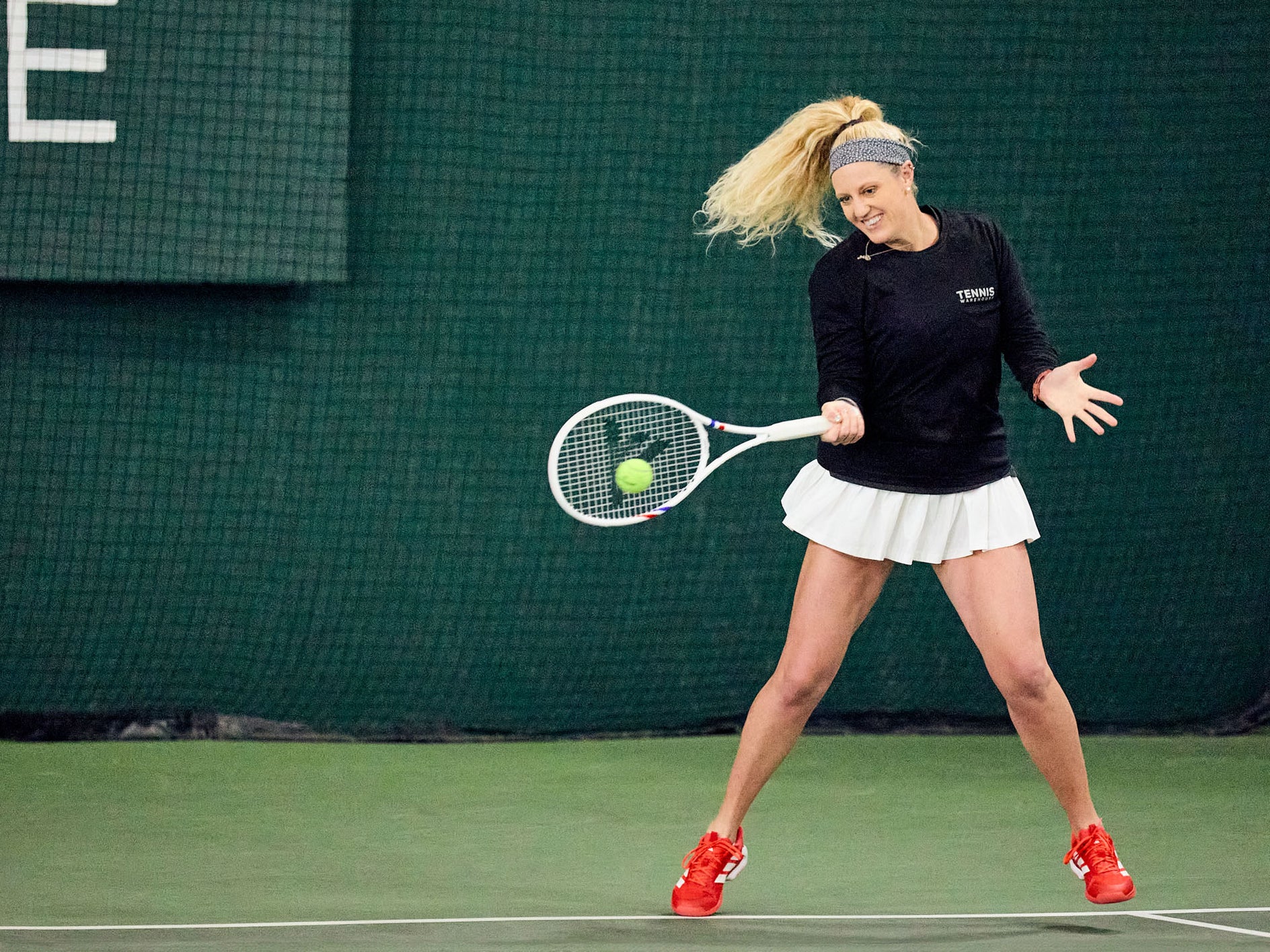 TW playtester hitting a forehand with the 315s.