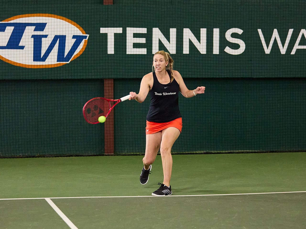 TW playtester hitting a forehand.
