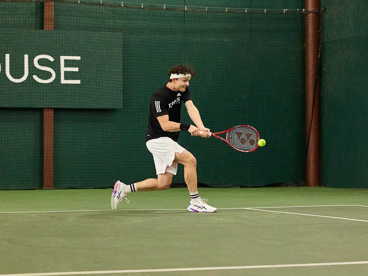 TW playtester hitting a backhand.