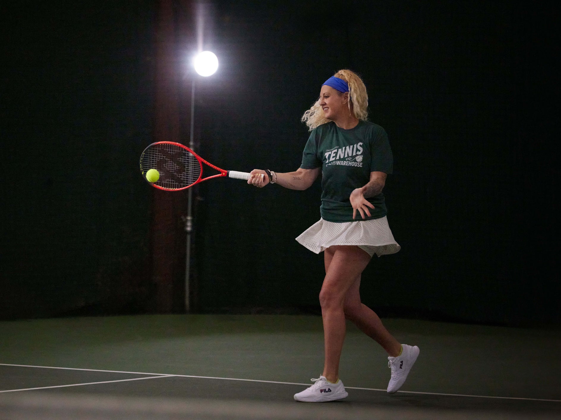 TW playtester hitting a forehand with the V8 315g. 