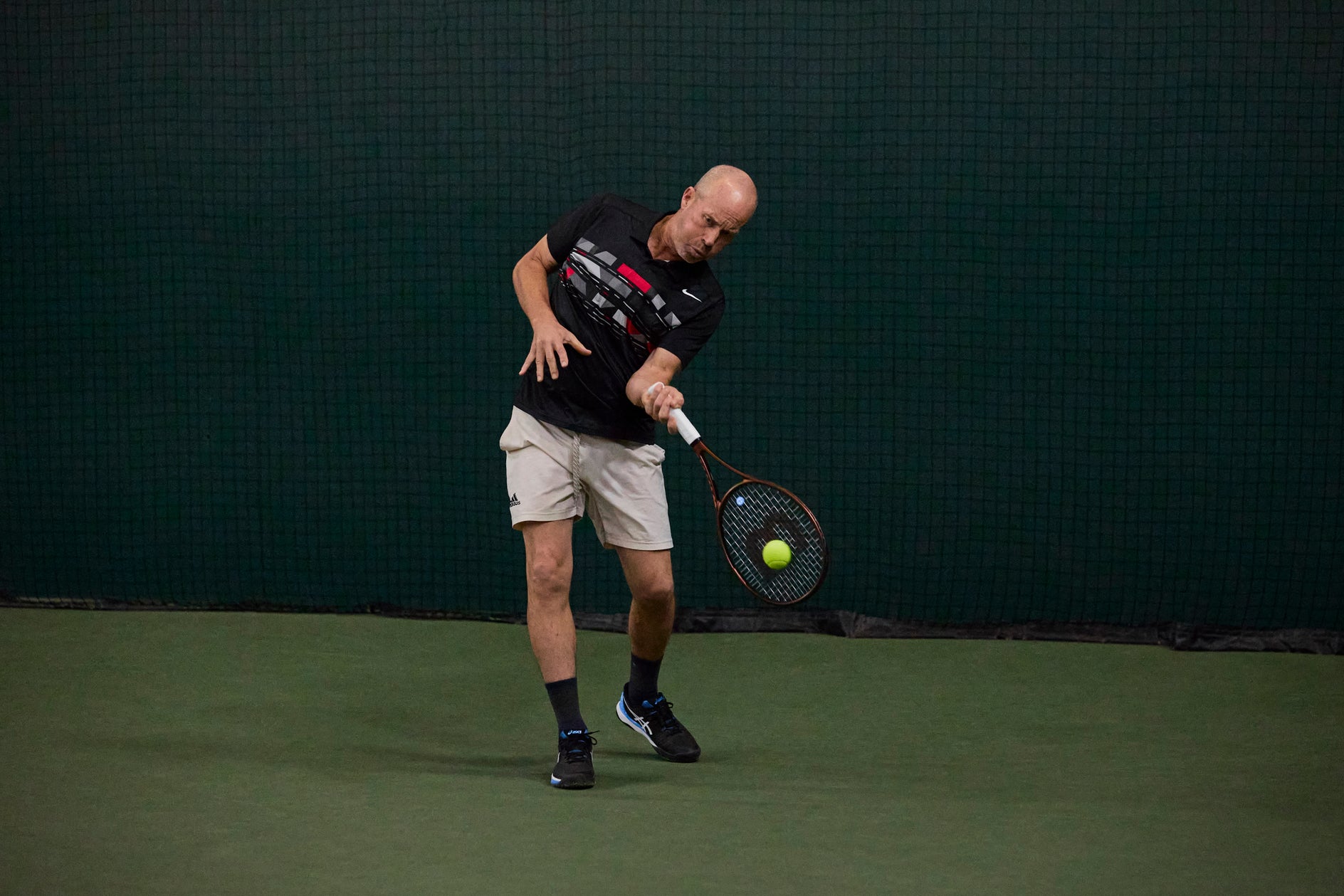 TW playtester hitting a forehand. 