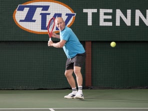 Image of a TW playtester hitting a return. 