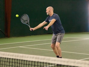Image of a Playtester Hitting a Volley