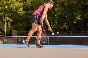 Image of a Playtester Hitting a Serve