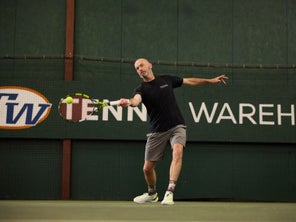 Image of a Playtester Hitting a forehand