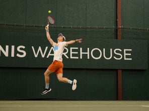 Image of a Playtester Hitting an Overhead