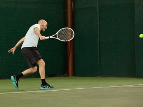 TW playtester hitting a backhand 