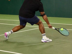 TW playtester sliding into a shot with the Asics Solution Speed FF 4s. 