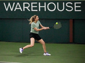 Image of Playtester Hitting a Backhand