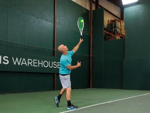 Image of a Playtester Hitting a Serve