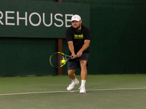 TW playtester hitting a backhand. 