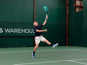 Image of a Playtester Hitting an Overhead