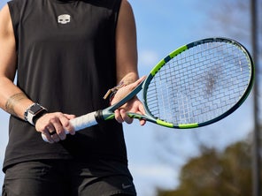 Image of a TW playtester prepping a serve. 
