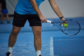 Image of a TW playtester preparing to serve. 