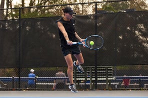 Image of a TW playtester hitting a backhand. 