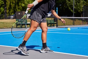 Image of a Playtester about to Hit a Serve