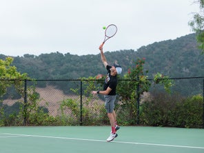Image of a Playtester Hitting a Serve