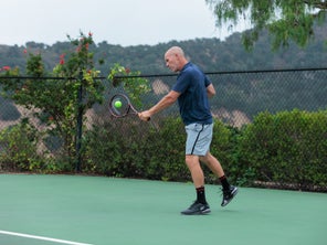 Image of a Playtester hitting a backhand