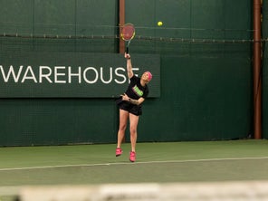 Image of a Playtester Hitting a Serve