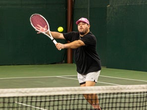 Image of a Playtester Hitting a Volley