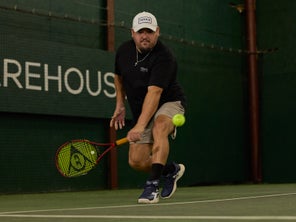 Image of a TW playtester hitting a return. 