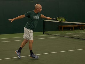 Image of a TW playtester hitting a volley. 
