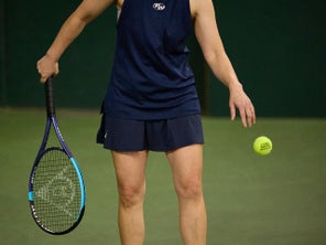 Image of a TW playtester about to serve. 