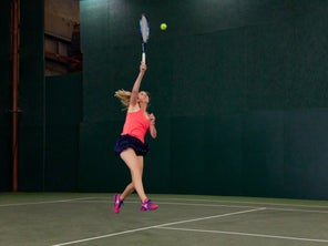 Image of a Playtester Hitting an Overhead