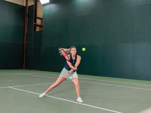 Image of a Playtester Hitting a Volley