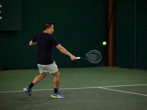 Image of Playtester Hitting a Backhand