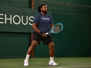 Image of a Playtester Getting Ready to Hit a Shot