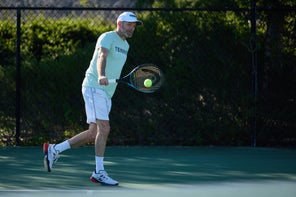 Image of a TW Playtester hitting a groundstroke. 