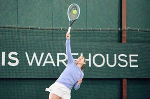 Image of a Playtester Hitting a Serve