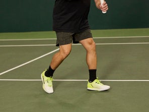 Image of a Playtester's Legs Hitting a Volley